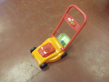 "Out There" Child's mini lawnmower